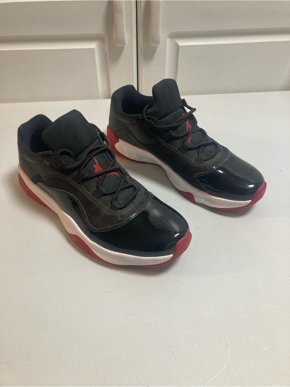Jordan Men's Low-Top Sneakers in Black, Red and White